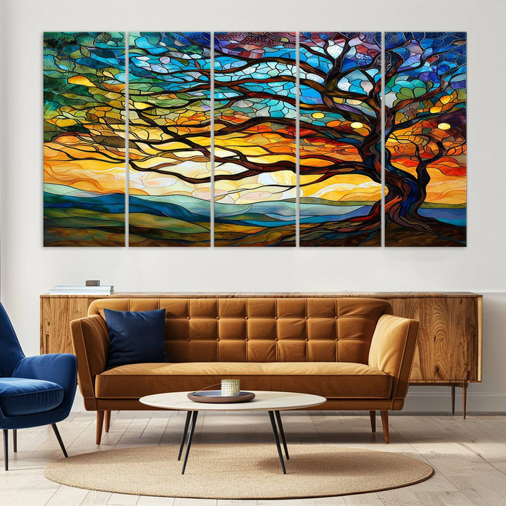 A vivid Tree of Life in stained glass style is depicted with twisted branches, a colorful sky, and hills on a ready-to-hang canvas.