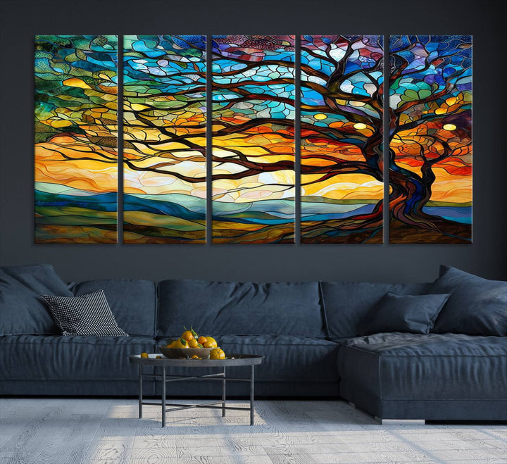 A vivid Tree of Life in stained glass style is depicted with twisted branches, a colorful sky, and hills on a ready-to-hang canvas.