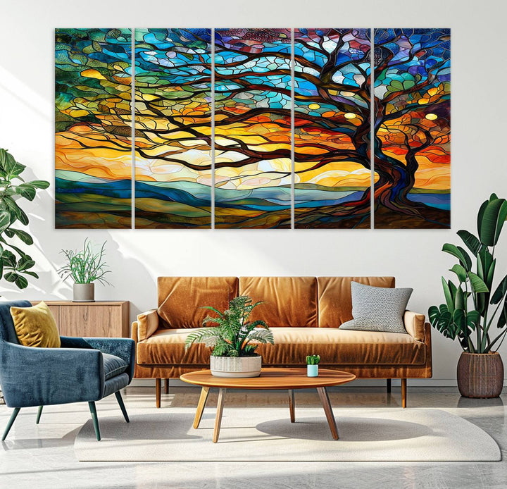 A vivid Tree of Life in stained glass style is depicted with twisted branches, a colorful sky, and hills on a ready-to-hang canvas.