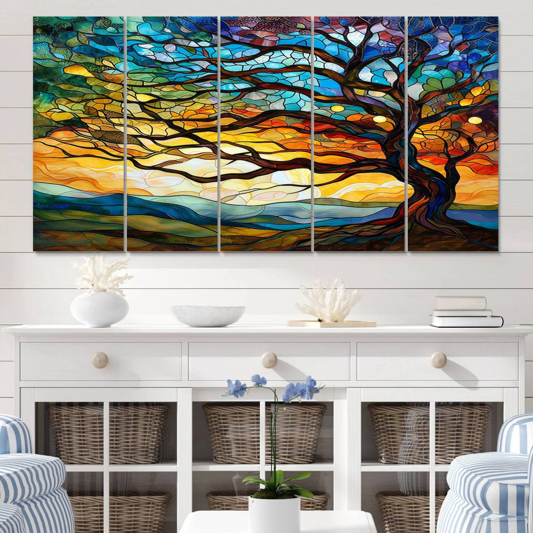 A vivid Tree of Life in stained glass style is depicted with twisted branches, a colorful sky, and hills on a ready-to-hang canvas.