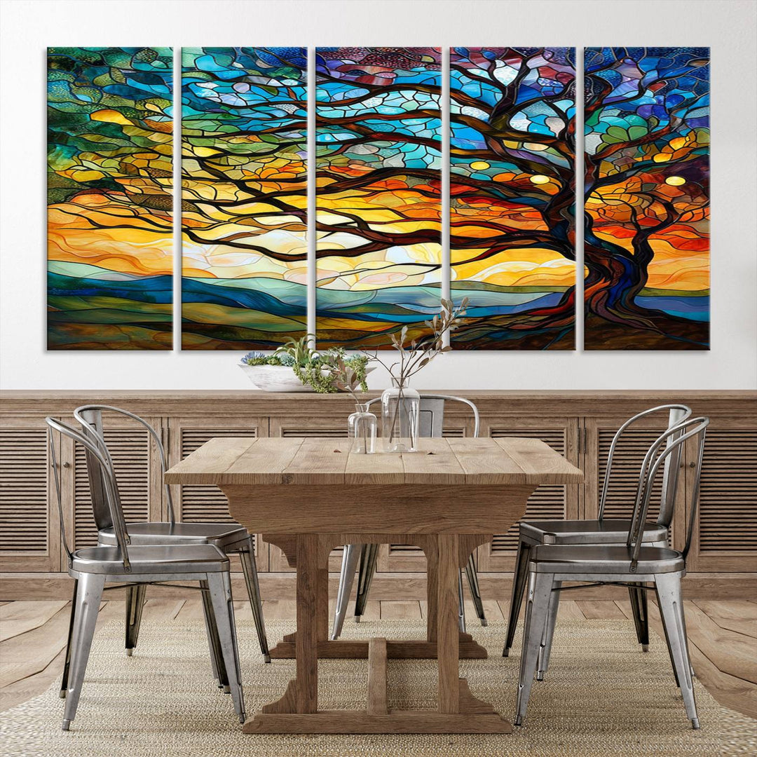 A vivid Tree of Life in stained glass style is depicted with twisted branches, a colorful sky, and hills on a ready-to-hang canvas.