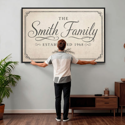 Personalized family sign wall art in a warm neutral room