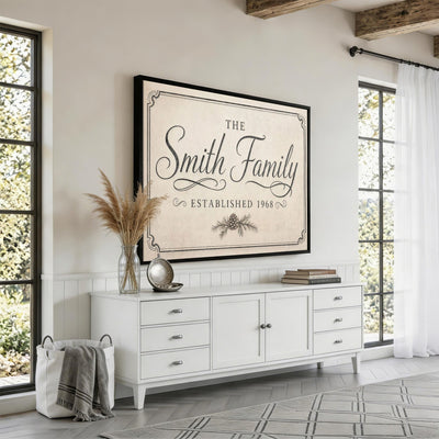 Family established sign in charcoal script on cream canvas
