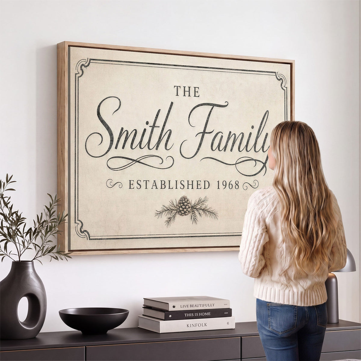 Custom family name sign wall art in a neutral room