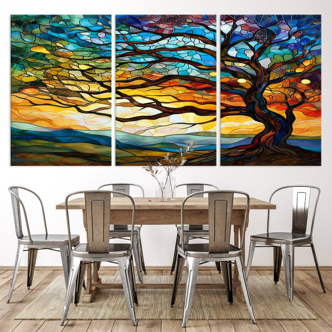 A vivid Tree of Life in stained glass style is depicted with twisted branches, a colorful sky, and hills on a ready-to-hang canvas.