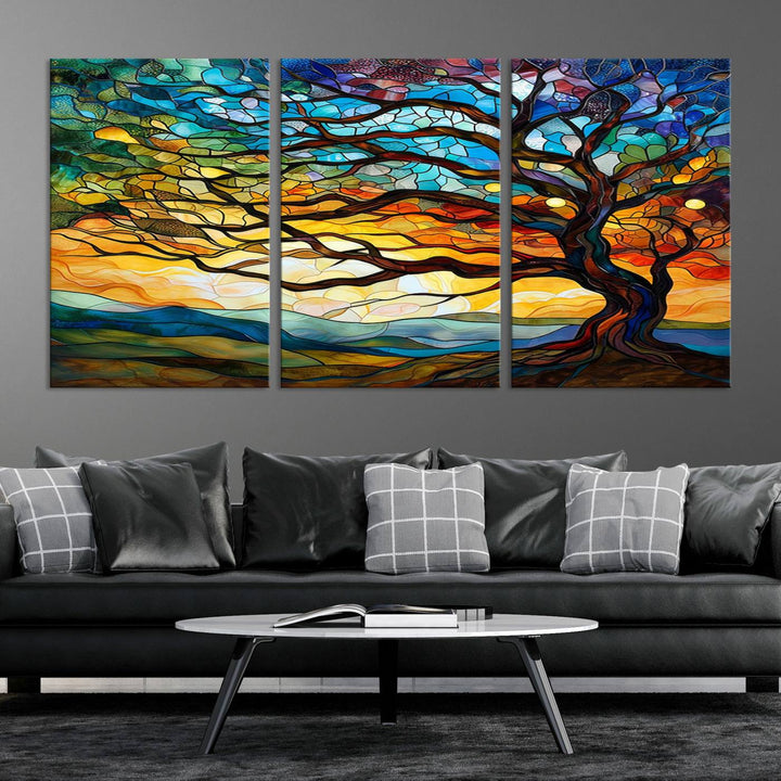 A vivid Tree of Life in stained glass style is depicted with twisted branches, a colorful sky, and hills on a ready-to-hang canvas.