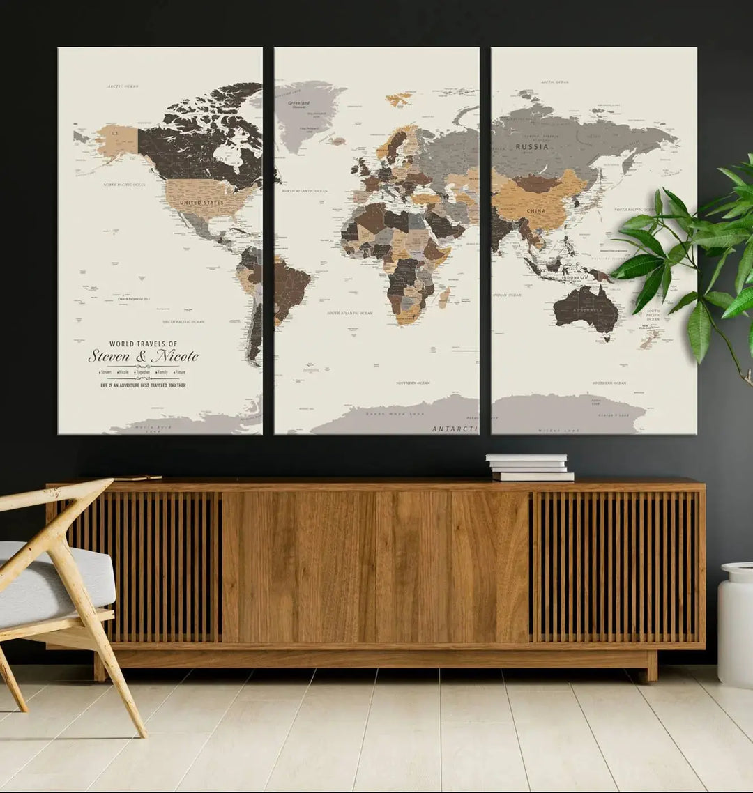 A large framed Personalized World Map Wall Art Canvas Print features custom text at the bottom, perfect for travel and exploration enthusiasts.