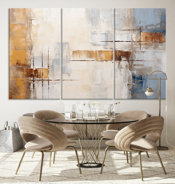 The Pastel Abstract Multi Panel Wall Art Canvas Print, featuring blue, white, and brown tones on museum-quality canvas, is ready to hang and includes a UV-protective coating for enduring vibrancy.