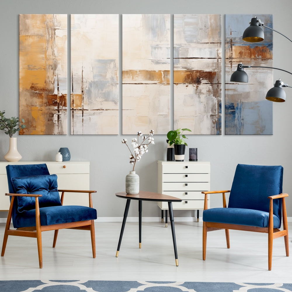 The Pastel Abstract Multi Panel Wall Art Canvas Print, featuring blue, white, and brown tones on museum-quality canvas, is ready to hang and includes a UV-protective coating for enduring vibrancy.