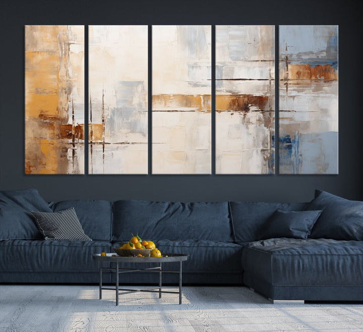 The Pastel Abstract Multi Panel Wall Art Canvas Print, featuring blue, white, and brown tones on museum-quality canvas, is ready to hang and includes a UV-protective coating for enduring vibrancy.