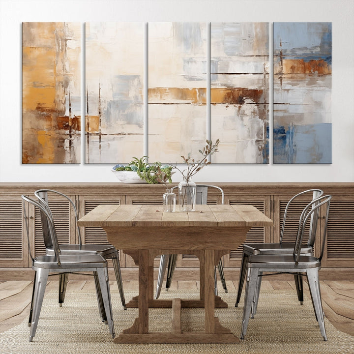 The Pastel Abstract Multi Panel Wall Art Canvas Print, featuring blue, white, and brown tones on museum-quality canvas, is ready to hang and includes a UV-protective coating for enduring vibrancy.